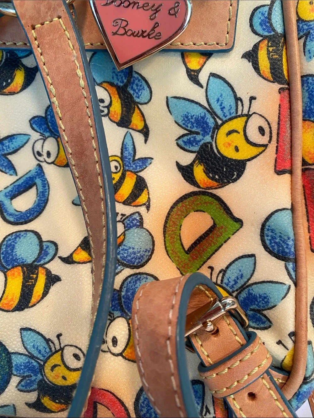 Dooney & Bourke Bee Print Satchel in Tan and Cream with Blue & Yellow Accents
